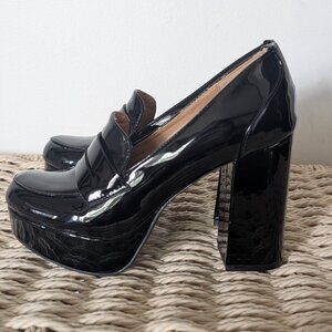 Black platform loafers